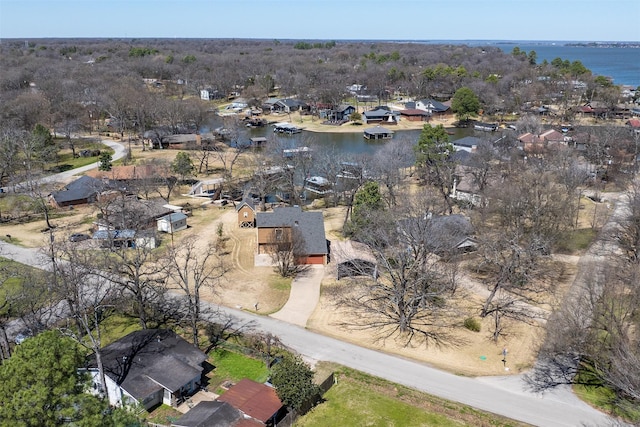 aerial view featuring a residential view and a water view