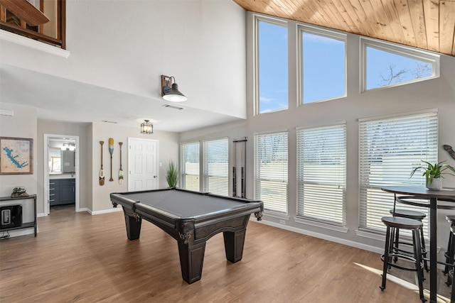 recreation room with visible vents, baseboards, high vaulted ceiling, pool table, and light wood-style floors