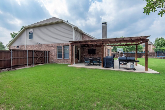 back of property with a patio, brick siding, a fenced backyard, and a pergola