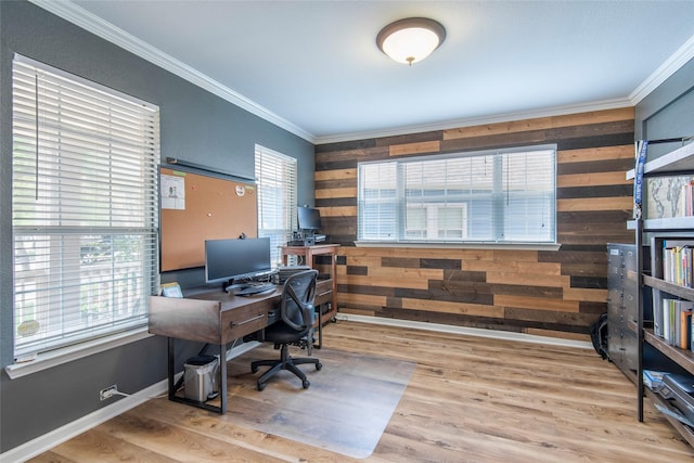 office with wood walls, crown molding, and wood finished floors