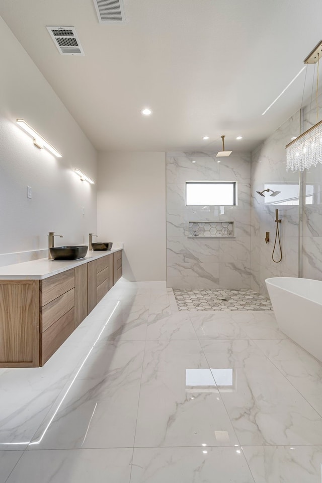 full bath with recessed lighting, marble finish floor, visible vents, and a marble finish shower