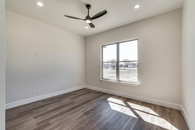 unfurnished room featuring ceiling fan, dark wood-style flooring, recessed lighting, and baseboards