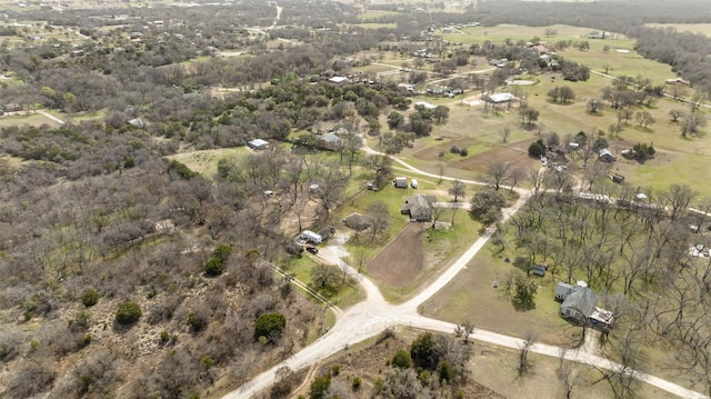 birds eye view of property featuring a rural view