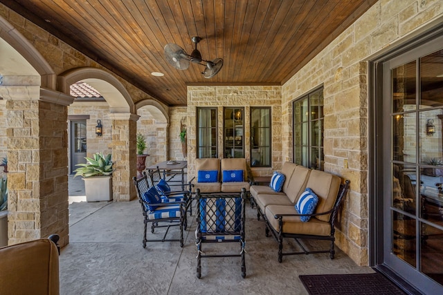 view of patio / terrace featuring a ceiling fan and an outdoor living space