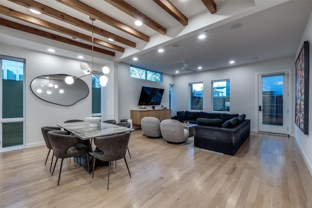 dining area with recessed lighting, baseboards, beamed ceiling, and light wood finished floors