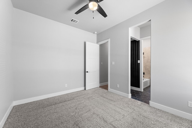 unfurnished bedroom featuring visible vents, baseboards, a ceiling fan, connected bathroom, and carpet