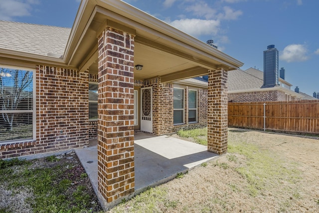 view of patio with fence