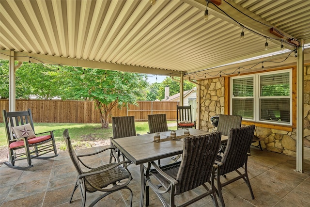 view of patio with fence private yard and outdoor dining area