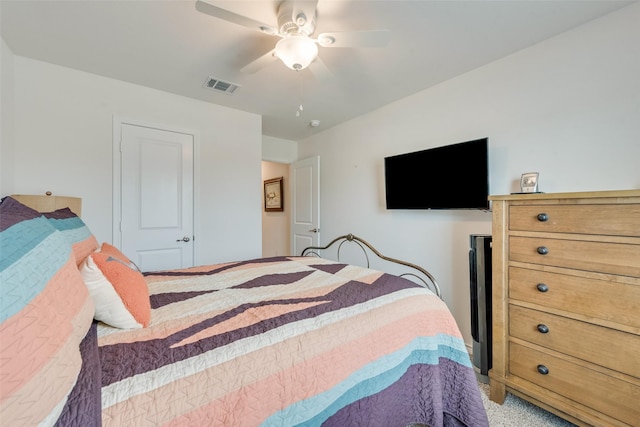 bedroom featuring visible vents and a ceiling fan