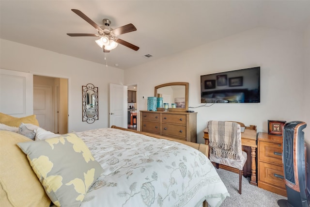 bedroom featuring carpet floors, visible vents, and ceiling fan