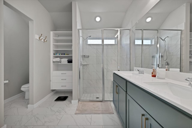 full bath featuring baseboards, marble finish floor, a sink, and a shower stall