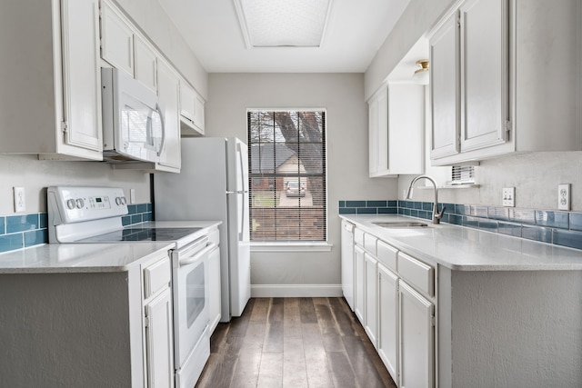 2901 Anysa Ln, Denton, TX 76209 - kitchen featuring white appliances, dark wood-type flooring, and white cabinets