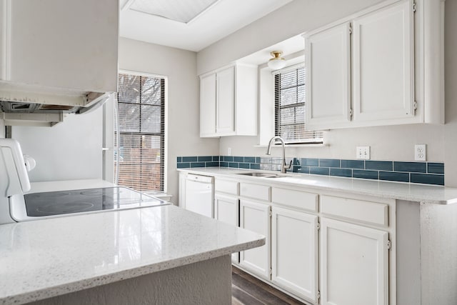 2901 Anysa Ln, Denton, TX 76209 - kitchen with dishwasher, range, healthy amount of natural light, and white cabinetry