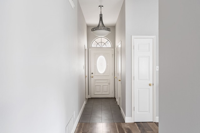 2901 Anysa Ln, Denton, TX 76209 - doorway featuring dark wood-style flooring and baseboards