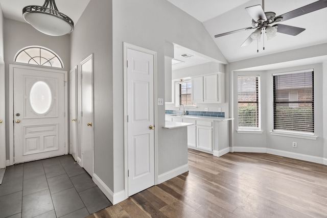 2901 Anysa Ln, Denton, TX 76209 - entryway with wood finished floors, ceiling fan, and high vaulted ceiling