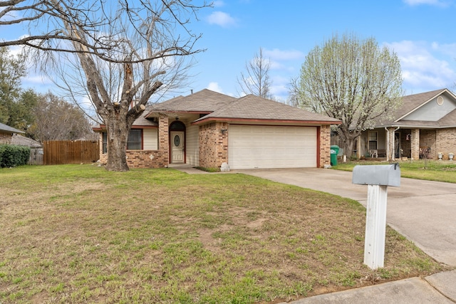 ranch-style home with a front yard, fence, concrete driveway, a garage, and brick siding