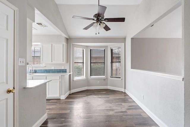 2901 Anysa Ln, Denton, TX 76209 - unfurnished dining area with vaulted ceiling, dark wood-type flooring, and a ceiling fan