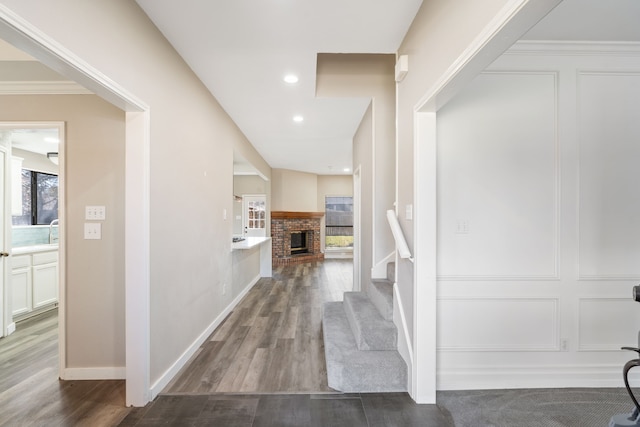 1542 Glenmore Dr, Lewisville, TX 75077 - hall featuring dark wood-type flooring, recessed lighting, and stairway
