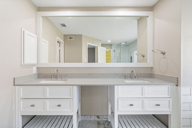 1542 Glenmore Dr, Lewisville, TX 75077 - bathroom with double vanity, marble look tiles, and a shower