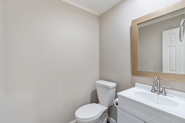 1542 Glenmore Dr, Lewisville, TX 75077 - bathroom featuring crown molding, toilet, and vanity