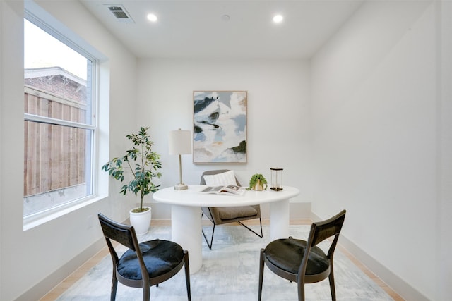 home office featuring a wealth of natural light, visible vents, and recessed lighting