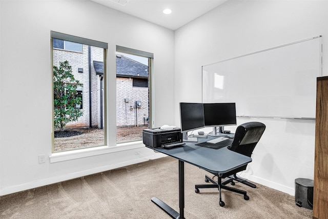 carpeted office space featuring visible vents, recessed lighting, and baseboards