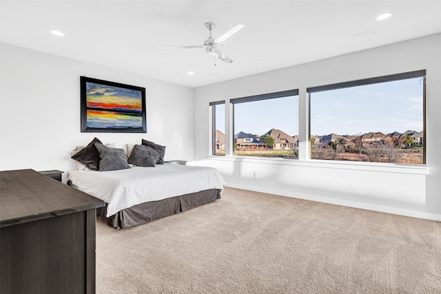 bedroom featuring visible vents, recessed lighting, carpet, and ceiling fan