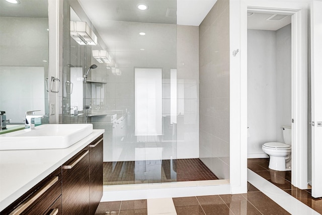 full bathroom with toilet, recessed lighting, a shower stall, tile patterned flooring, and vanity