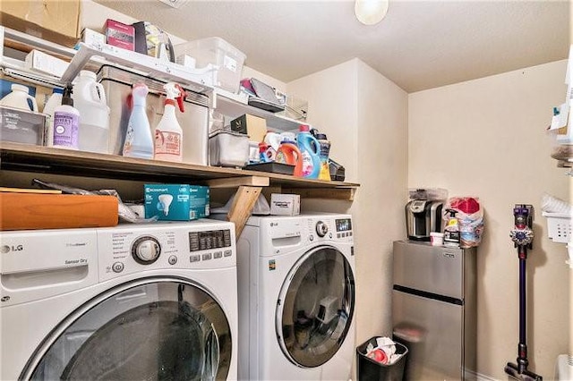 laundry room featuring laundry area and separate washer and dryer