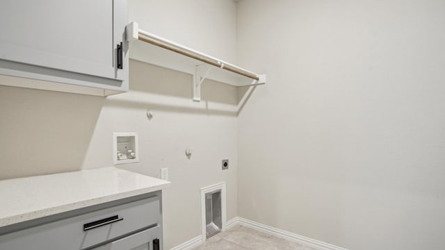 laundry area with baseboards, cabinet space, electric dryer hookup, washer hookup, and hookup for a gas dryer