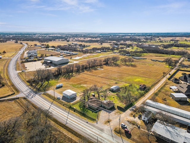 birds eye view of property featuring a rural view