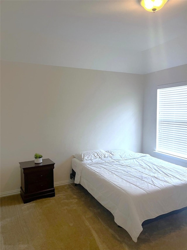 bedroom with light carpet