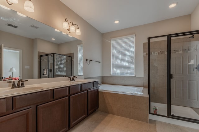 full bath featuring a sink, visible vents, and a shower stall