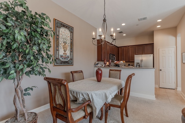 dining space with recessed lighting, visible vents, light carpet, and baseboards