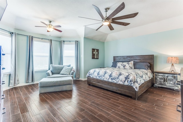 bedroom featuring ceiling fan, lofted ceiling, baseboards, and wood finish floors