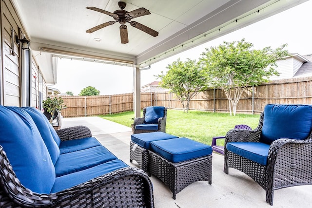 view of patio / terrace with ceiling fan, outdoor lounge area, and a fenced backyard