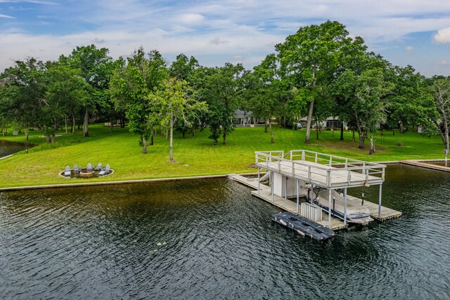 7811 Double Oaks Rd, Athens, TX 75752 - dock with a water view, view of scattered trees, and a lawn