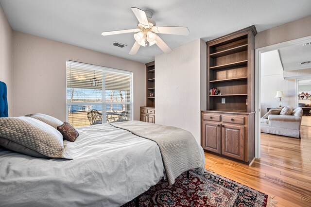 7811 Double Oaks Rd, Athens, TX 75752 - bedroom featuring light wood-style floors and ceiling fan