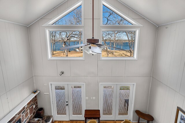 7811 Double Oaks Rd, Athens, TX 75752 - detailed view of french doors, a decorative wall, crown molding, and a nearby body of water