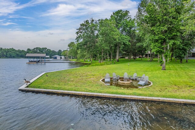 7811 Double Oaks Rd, Athens, TX 75752 - dock area with a fire pit, a water view, and a lawn
