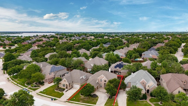 aerial view featuring a water view and a residential view