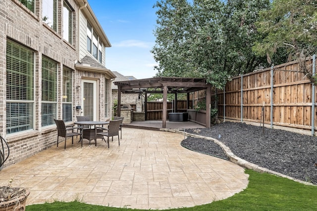 view of patio / terrace featuring outdoor dining space, a fenced backyard, and a pergola