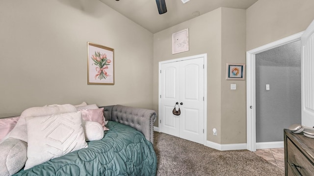 bedroom with carpet, ceiling fan, and baseboards