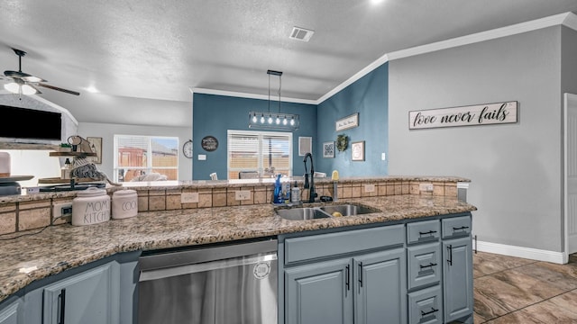 kitchen with a textured ceiling, a sink, open floor plan, stainless steel dishwasher, and ornamental molding