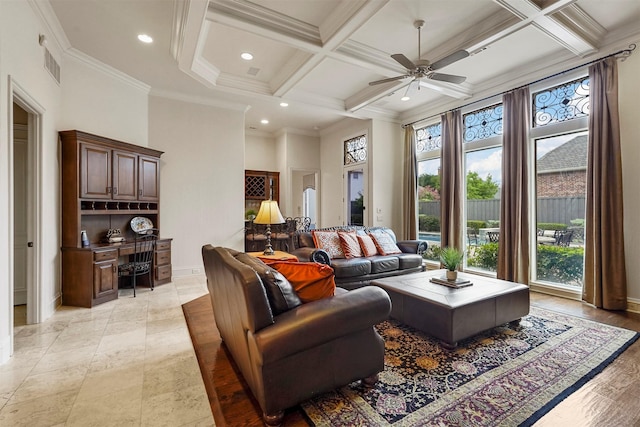 living area with built in desk, beamed ceiling, coffered ceiling, and a towering ceiling