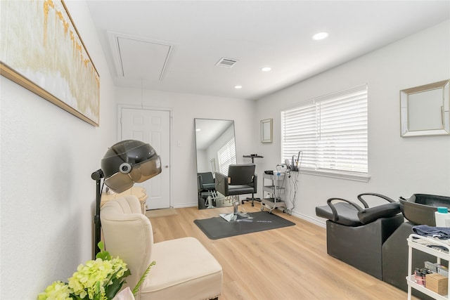 workout room featuring attic access, baseboards, visible vents, wood finished floors, and recessed lighting