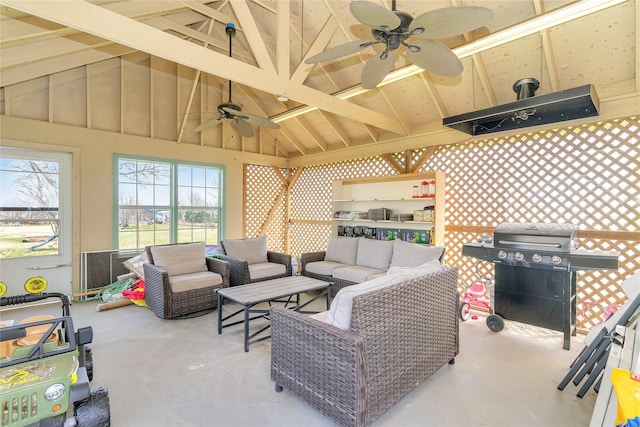 exterior space featuring ceiling fan, an outdoor living space, and area for grilling