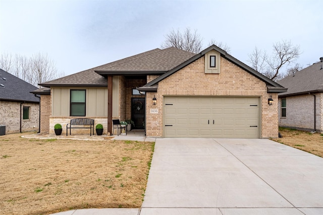 view of front of home with brick siding, a shingled roof, concrete driveway, an attached garage, and board and batten siding