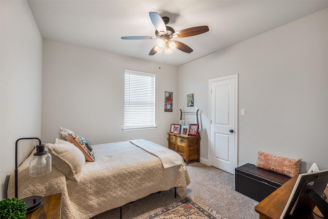 carpeted bedroom with a ceiling fan