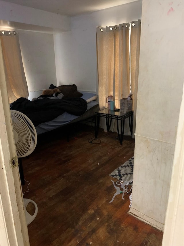 bedroom featuring wood-type flooring